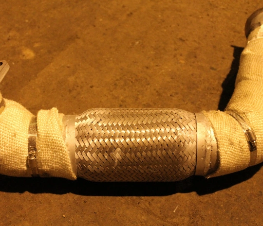 Труба выхлопная (гофра от турбины к глушителю) 12M11-03010-EA {HIGER 6118}